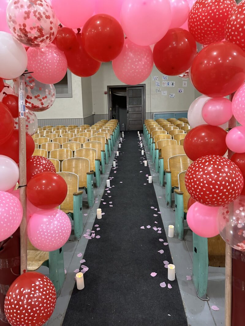 GALentines decorations pink and red balloons