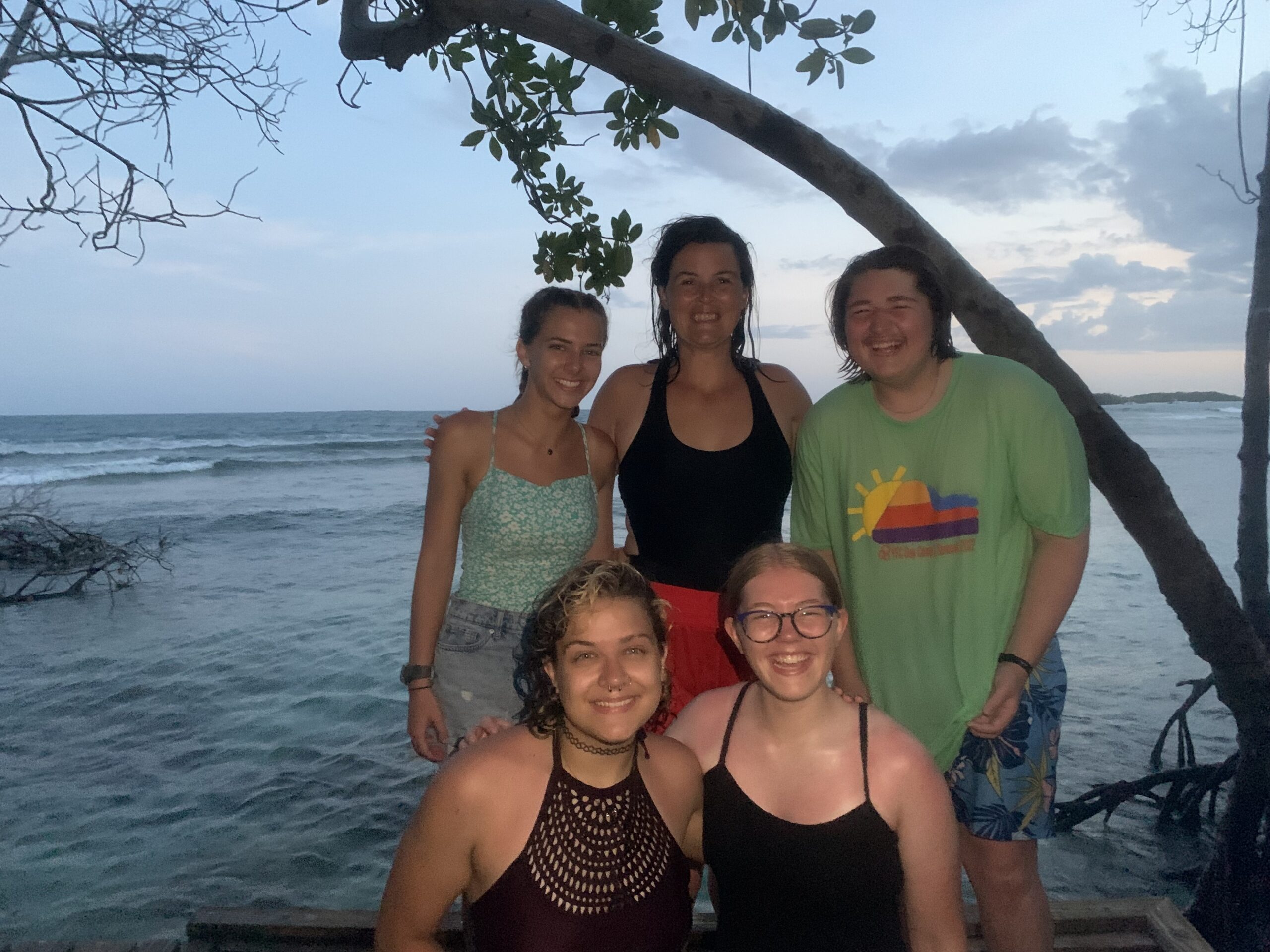 5 people infront of the ocean in Puerto Rico