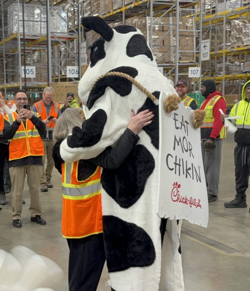 Cindy hugging Chick fil A cow